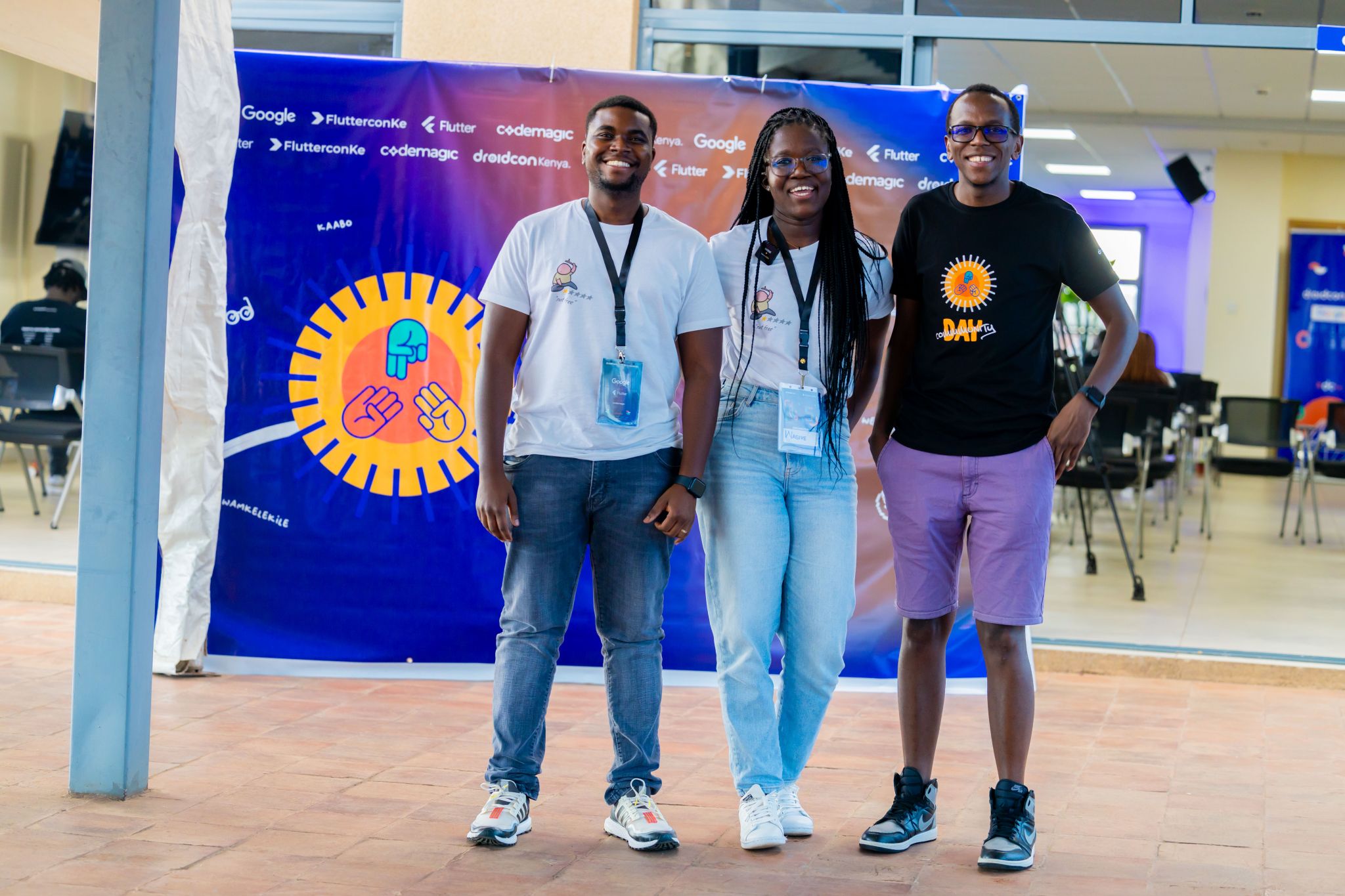 Christine Wasike with fellow organisers at a FlutterCon and Droidcon Kenya community event